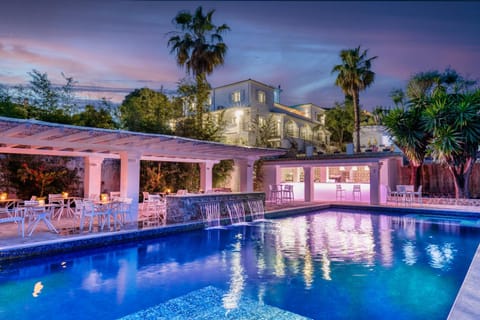 Property building, Patio, Night, Pool view, Swimming pool, sunbed