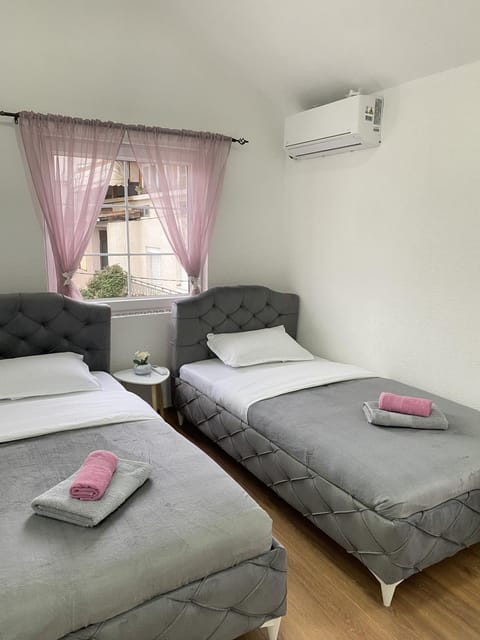 Bed, Photo of the whole room, Bedroom, towels, air conditioner