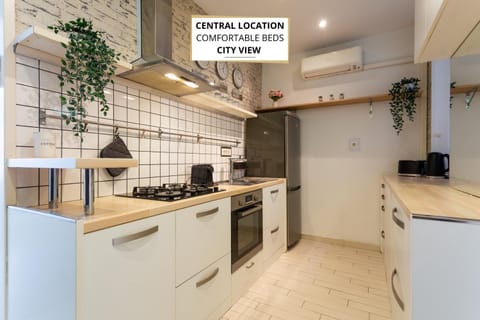 Kitchen or kitchenette, oven, stove
