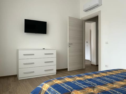 Bed, TV and multimedia, wardrobe, air conditioner