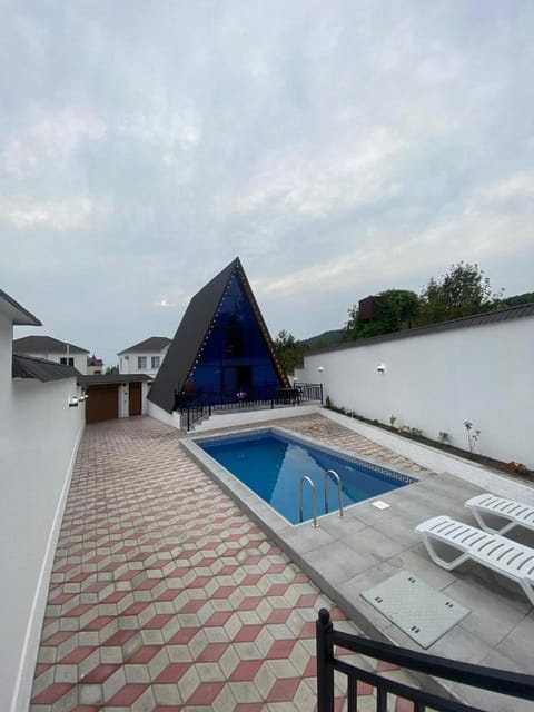 Property building, Patio, Day, Natural landscape, View (from property/room), Balcony/Terrace, Pool view, Swimming pool