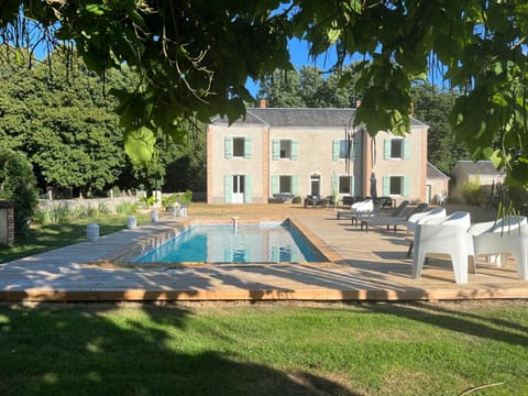 Property building, Living room, Swimming pool