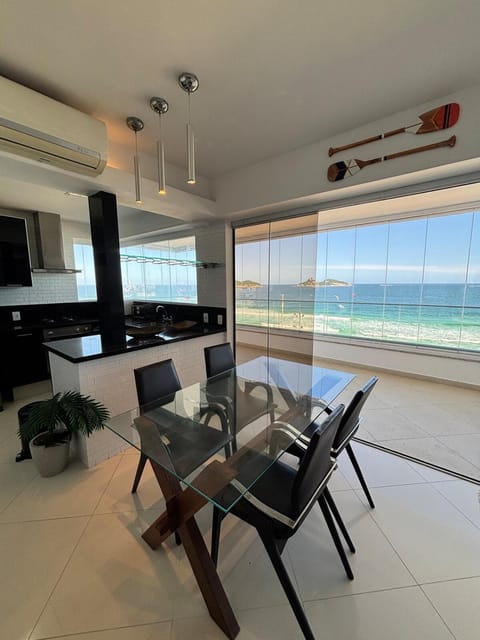 Natural landscape, Kitchen or kitchenette, Living room, Seating area, Dining area, Beach, Sea view