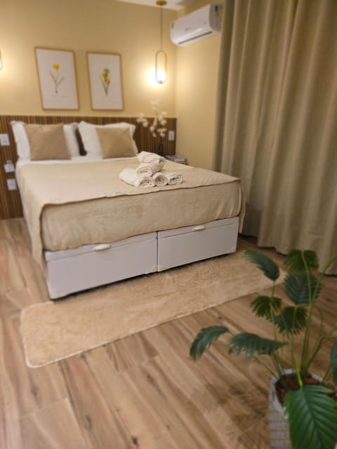 Photo of the whole room, air conditioner