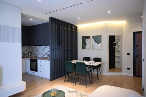 Kitchen or kitchenette, Living room, Seating area, Dining area
