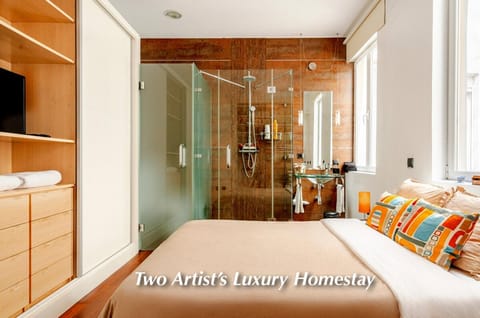 Shower, Toilet, Bed, Photo of the whole room, Bedroom, bidet, hair dryier, heating, wardrobe, air conditioner