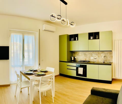 Living room, Seating area, Dining area, oven, stove, air conditioner