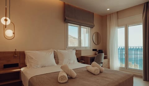 Bed, View (from property/room), Seating area, Sea view, towels