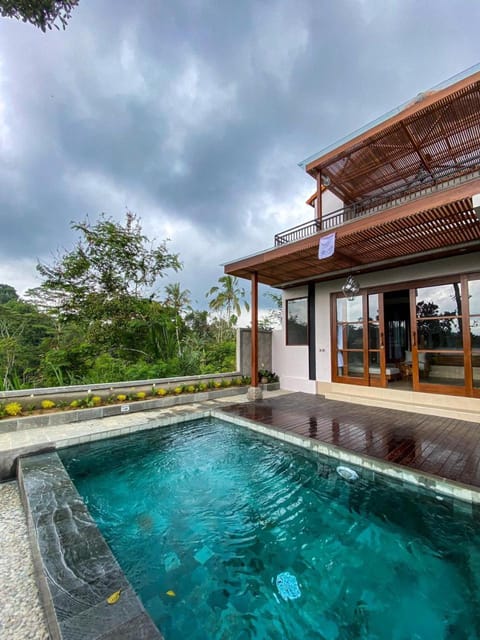 Property building, Patio, Natural landscape, Pool view, Swimming pool