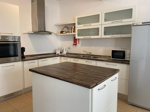 Kitchen or kitchenette, oven, stove, toaster