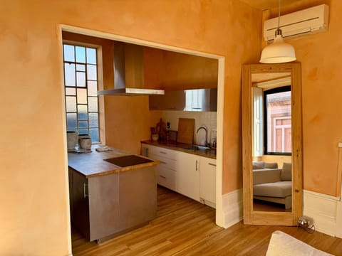 Kitchen or kitchenette, Seating area, Dining area, air conditioner