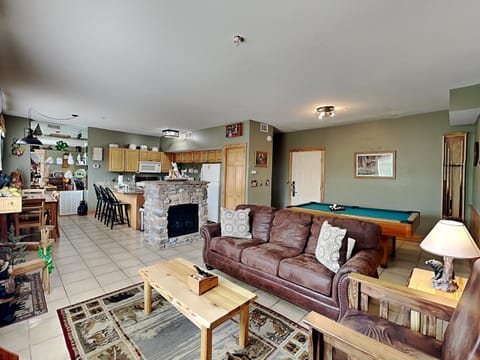 Billiard, Kitchen or kitchenette, Living room, Seating area, fireplace, furniture, kitchen