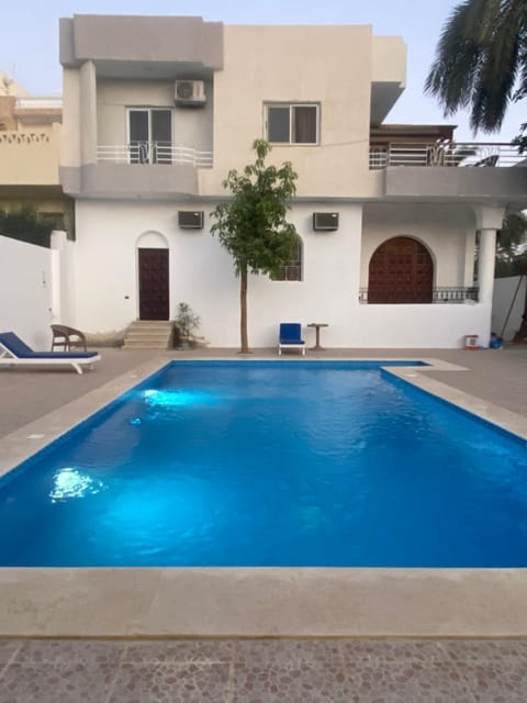 Property building, Patio, Day, Pool view, Swimming pool, sunbed