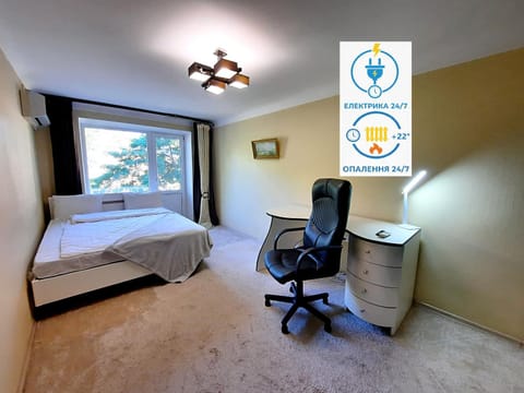 Bed, Property logo or sign, Photo of the whole room, Logo/Certificate/Sign, Bedroom, Text overlay, Certificate/Award