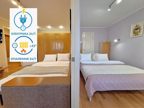 Bed, Property logo or sign, Photo of the whole room, Logo/Certificate/Sign, Bedroom, Text overlay, Certificate/Award