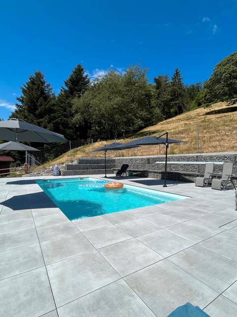 Property building, Living room, Swimming pool