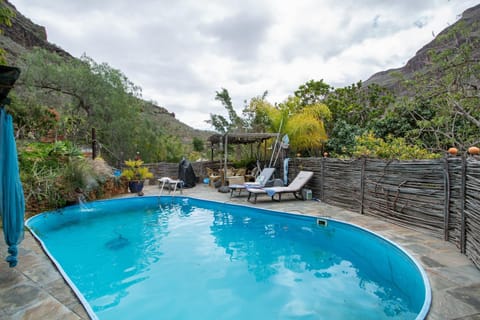 Property building, Living room, Swimming pool