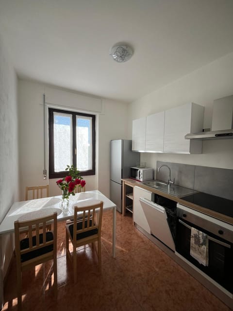 Dining area, dishwasher, oven, stove