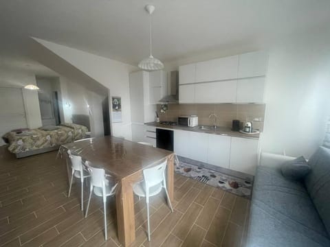 Kitchen or kitchenette, Living room, Dining area, stove