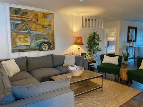 Surf Shack - Steps to the beach, lush fenced backyard by Beach Haven Vacation Rentals Apartment in Lower Grand Lagoon