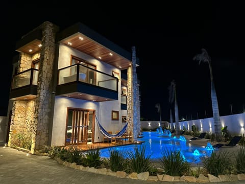 Property building, Patio, Night, Pool view, Swimming pool, sunbed