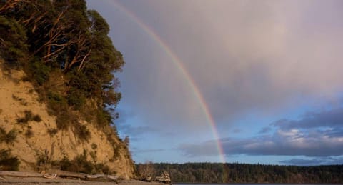 Amazing Sunrise at Coastal Luxury Cabin Rental on Herron Island with Fire Pit and Paddle Boarding near Olympia, Washington Cabin in Herron Island