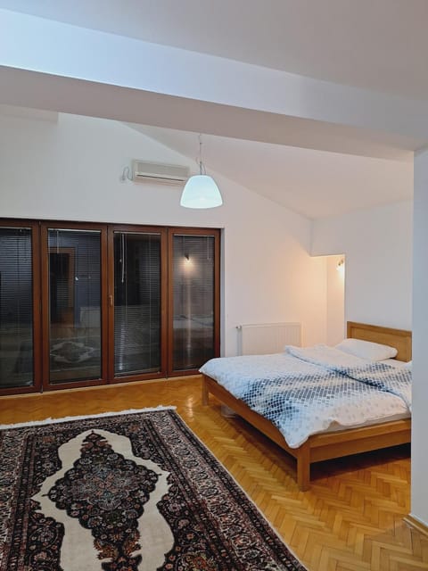 Toilet, Bed, Balcony/Terrace, Bedroom, towels, wardrobe, air conditioner