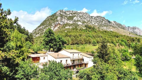 Property building, Spring, Day, Natural landscape, Mountain view