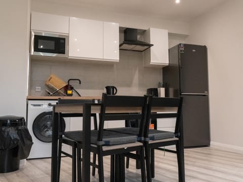 Kitchen or kitchenette, Dining area, oven, stove, toaster