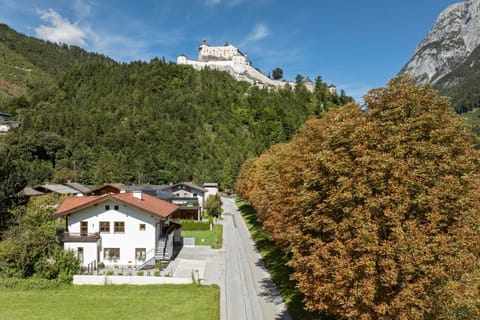 Property building, Nearby landmark, Spring, Day, Natural landscape, Mountain view