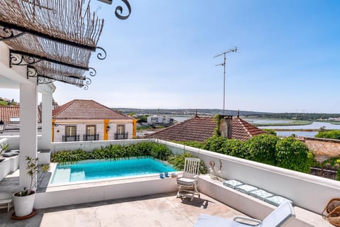 Property building, Living room, Swimming pool