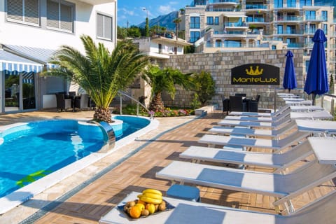 Patio, Nearby landmark, Natural landscape, Activities, Logo/Certificate/Sign, Garden view, Mountain view, Pool view, Area and facilities, Supermarket/grocery shop, Shopping Area, Swimming pool, Entertainment, Drinks, Non alcoholic drinks, young children, young children, older children, older children, group of guests, group of guests, Certificate/Award, Certificate/Award, Open Air Bath, Public Bath, Public Bath, Family, Family, sunbed