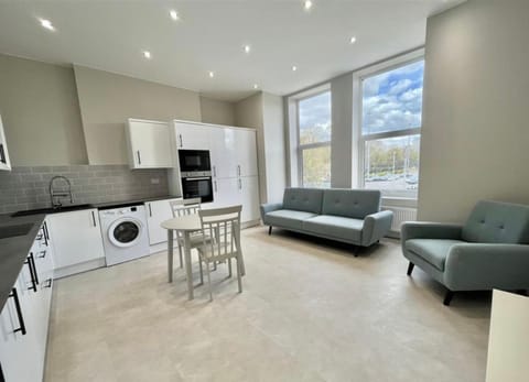 Kitchen or kitchenette, Living room, Seating area, Dining area, oven, stove, washing machine