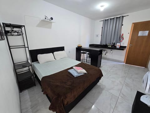 Bed, TV and multimedia, Living room, Photo of the whole room, Seating area, Bedroom