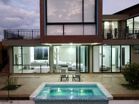 Property building, Patio, Day, BBQ facilities, Solarium, View (from property/room), Balcony/Terrace, Pool view, Swimming pool, fireplace, sunbed