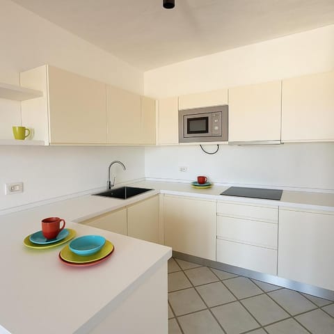 Kitchen or kitchenette, oven, stove