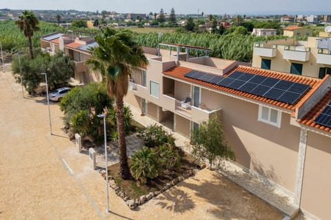 Property building, Spring, Day, Neighbourhood, Natural landscape, Bird's eye view, Garden, City view, Street view