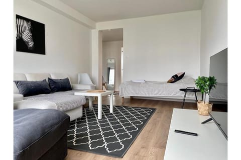 Bed, Living room, Seating area