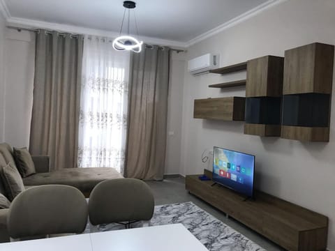 Communal lounge/ TV room, TV and multimedia, Living room, Photo of the whole room, Seating area, air conditioner