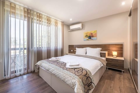 Bed, Photo of the whole room, Bedroom, towels, air conditioner