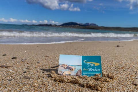 Nearby landmark, Day, Property logo or sign, Natural landscape, Beach