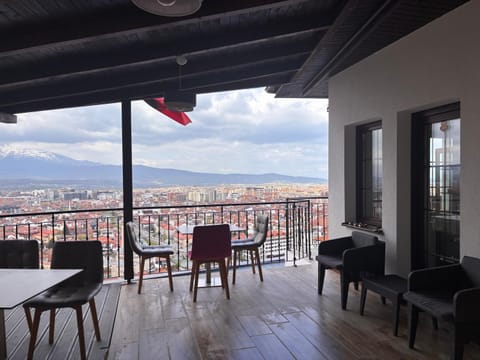Natural landscape, View (from property/room), Seating area, City view, Mountain view