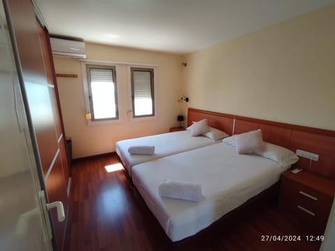 Bed, Photo of the whole room, Bedroom, towels, air conditioner
