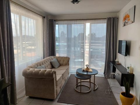 TV and multimedia, View (from property/room), Living room, Seating area