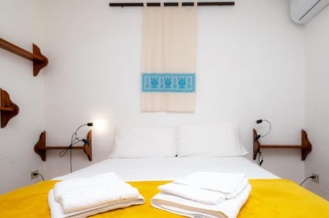 Bed, Photo of the whole room, Bedroom, towels, air conditioner