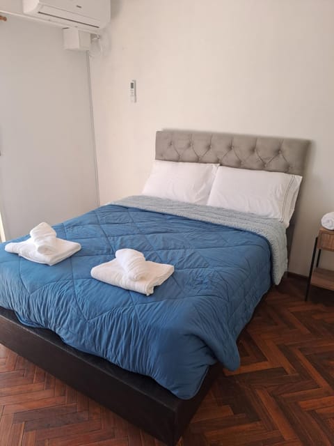 Bed, Photo of the whole room, Bedroom, towels, air conditioner