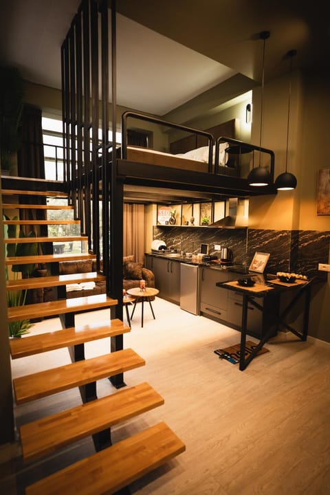 Kitchen or kitchenette, Living room, Seating area, Dining area