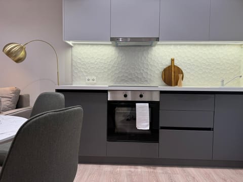 Kitchen or kitchenette, stove