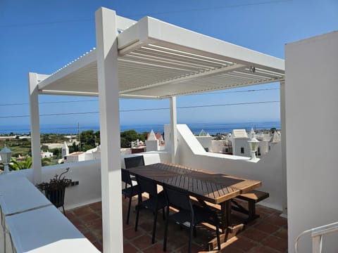 Property building, Day, Natural landscape, View (from property/room), Balcony/Terrace, Dining area, Sea view
