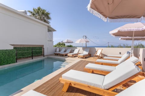 Property building, Living room, Swimming pool
